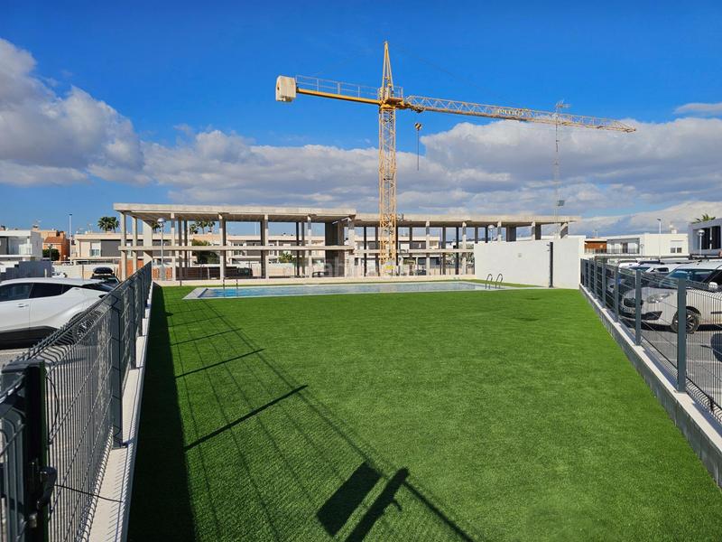 Foto fcbf139a-626d-4130-be6b-a3d6f18e7b6a. Maison avec parking piscine dans Monte y Mar Santa Pola