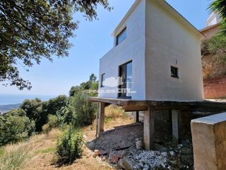 Casa en Calle sant celoni 0. Bunwalow estilo ibicenco con vistas al mar, en la montaña de cal