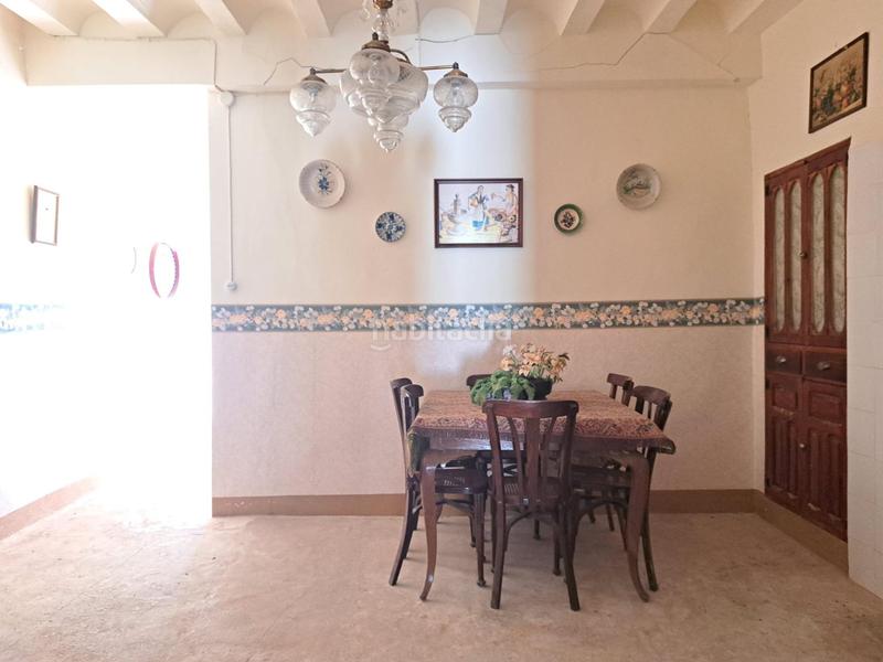 Foto 183f1753-54ce-49c2-ac16-c8a15ea8ada8. Casa adossada a calle calle Requena casas río a Requena