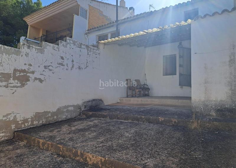 Foto 6365430f-e195-4f38-b348-99486d999b68. Casa adossada a calle calle Requena casas río a Requena