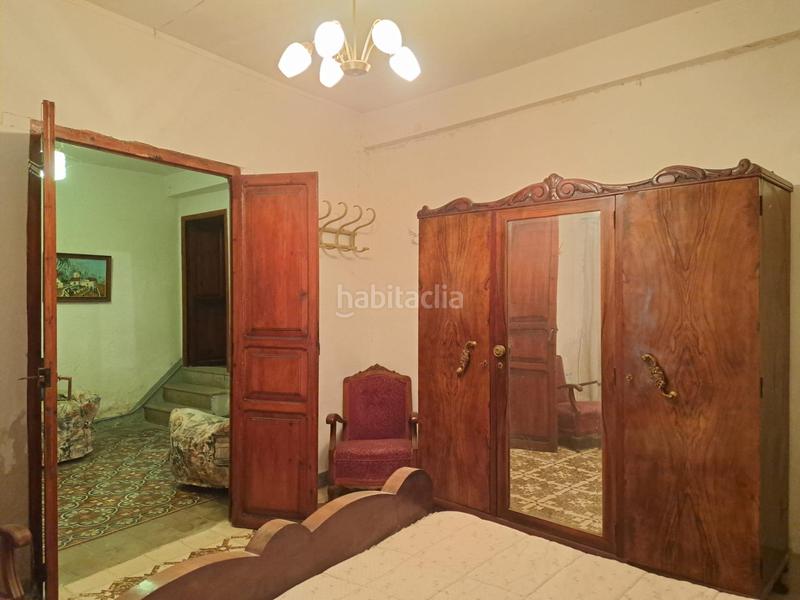 Foto 73737ac8-fd14-4ee1-9fc7-748d688dad1a. Casa en calle progreso derramador 13 bonita casa de pueblo con amplio patio y fachada a dos calles. en Requena