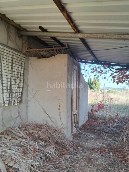 Foto d3eae435-d1da-4da6-9021-c3cb6655892b. Masía en calle calle Requena casa de campo próxima a con pequeña nave. en Requena