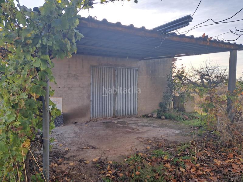 Foto d5806e8d-2e53-4073-bf7a-ae8d439fe3d9. Masía en calle calle Requena casa de campo próxima a con pequeña nave. en Requena