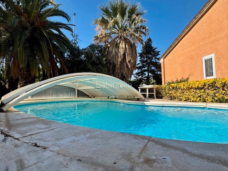 Foto edb571d2-a5fd-40c7-8f95-951a803e0db6. Maison avec cheminée chauffage parking piscine dans San Antonio de Benagéber