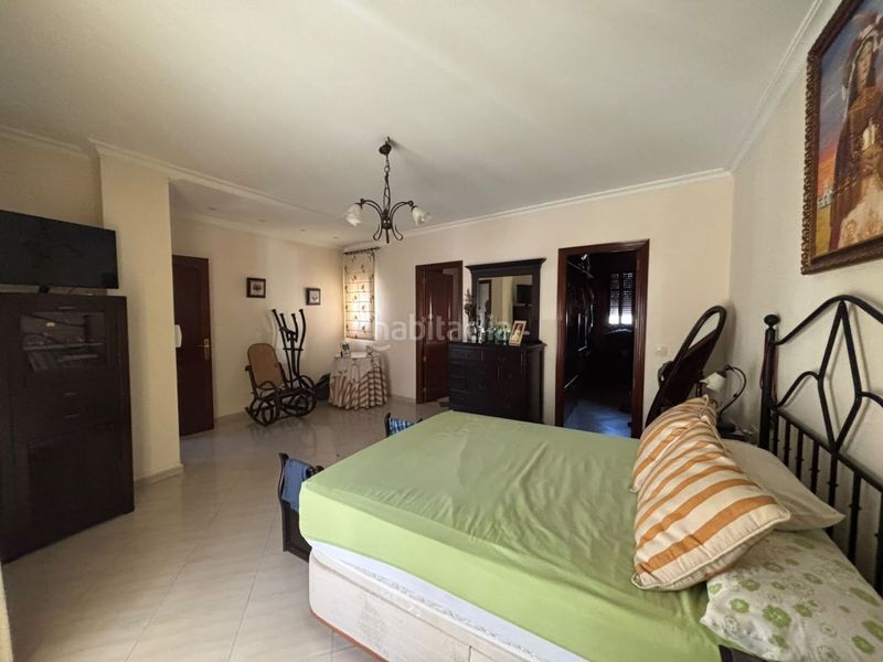 Foto c0c268ab-11c1-4115-85e3-995b6307d304. Casa amb aparcament a Oromana Alcalá de Guadaira