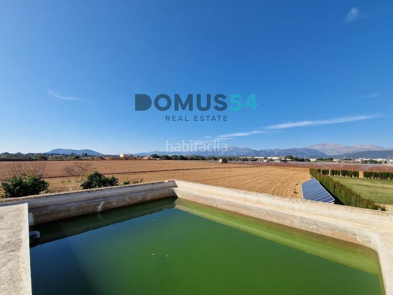 Foto 0d6cb170-d3f4-4987-bedc-bdedd9ae6bb6. Country house with heating parking pool in Búger