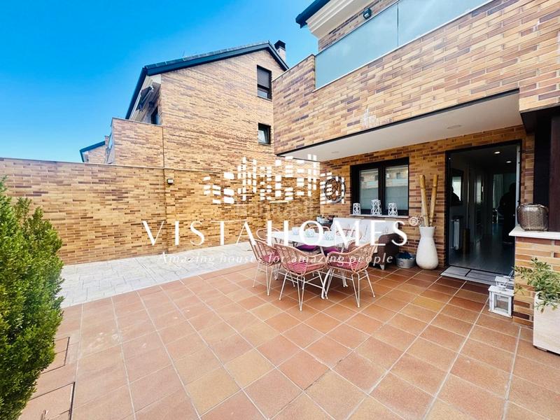 Foto 0cb9ce6c-e0d3-4284-bb92-d1ed85b08787. Casa aparellada amb calefacció aparcament piscina a San Agustín de Guadalix