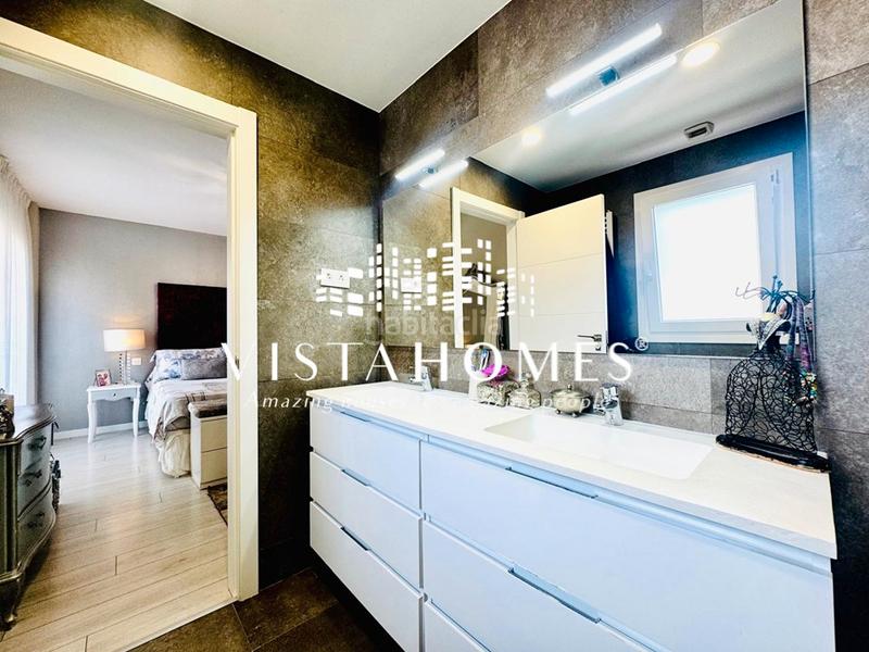 Foto 648894f2-c76b-4699-a7f3-f0c68d124313. Casa aparellada amb calefacció aparcament piscina a San Agustín de Guadalix