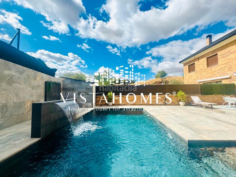 Foto 6695d5ed-5d64-47b9-ad2e-3b69b44bce4a. Casa aparellada amb calefacció aparcament piscina a San Agustín de Guadalix