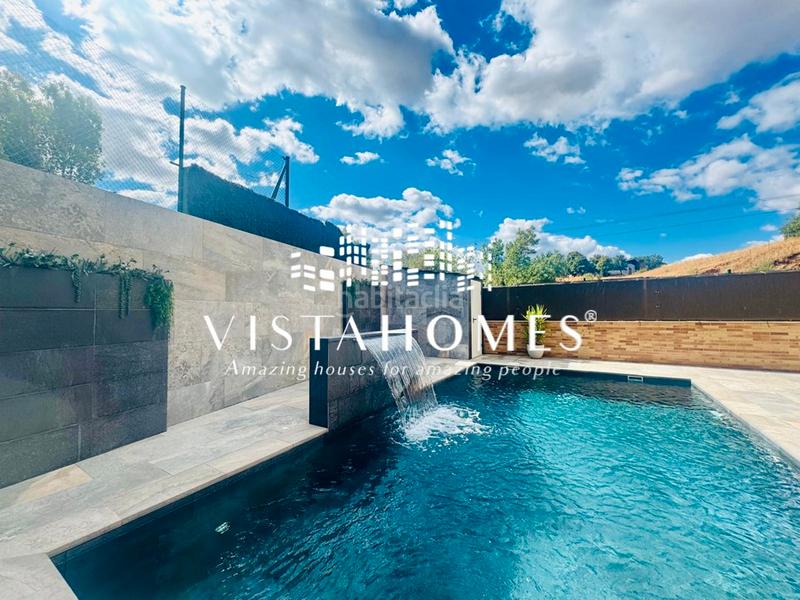 Foto 7ab7de29-43cb-488e-8c2e-7b118899f66a. Casa aparellada amb calefacció aparcament piscina a San Agustín de Guadalix