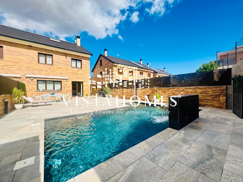 Foto b0d80788-b0e5-45e1-b5c5-6dc82b0f0ac8. Casa aparellada amb calefacció aparcament piscina a San Agustín de Guadalix