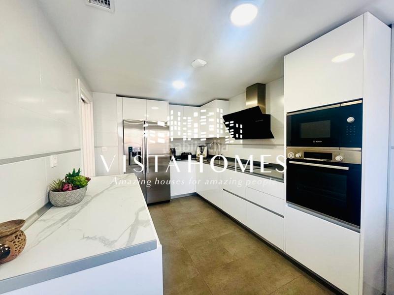 Foto fdf50bb0-43e2-4e17-994e-51e033debf15. Casa aparellada amb calefacció aparcament piscina a San Agustín de Guadalix