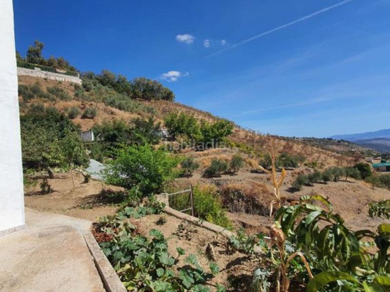 Foto f95c4095-4c29-438a-9ff2-0c227bd76464. Bauernhof mit parking pool in Yunquera