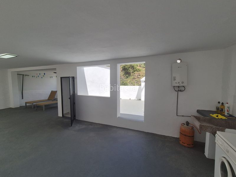 Foto 53727982-9eb0-4b25-bf6f-d20b87827063. Casa adossada amb xemeneia calefacció a Tolox