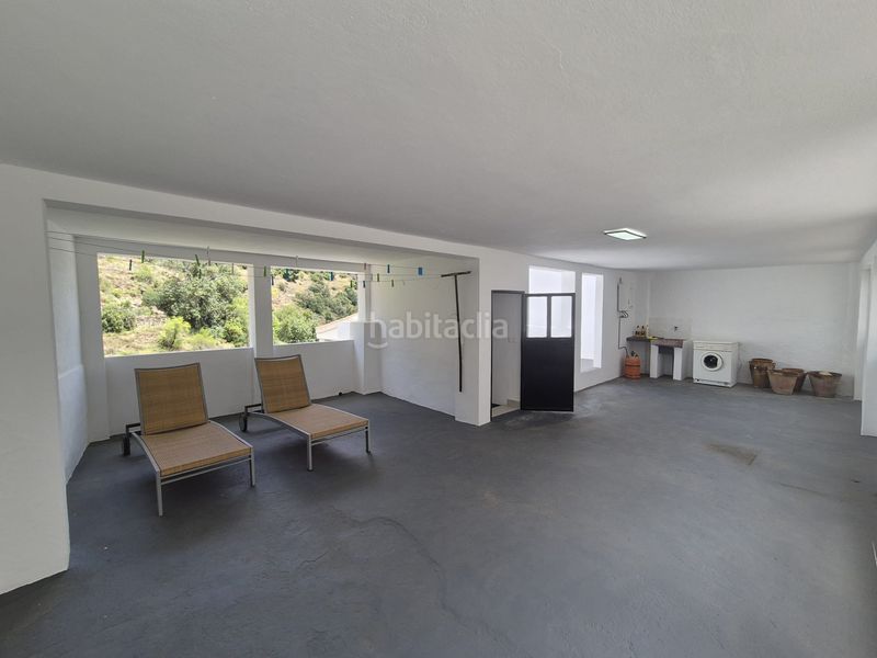 Foto f9fa8ae5-404c-4a38-8ff6-daffcf440ae3. Casa adossada amb xemeneia calefacció a Tolox