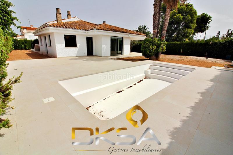 Foto b1ab4d87-85af-41c3-9fcb-2b4e2d860945. Chalet espectacular chalet reformado, nuevo a estrenar en la calle cabanes de benicasim en Benicasim / Benicàssim