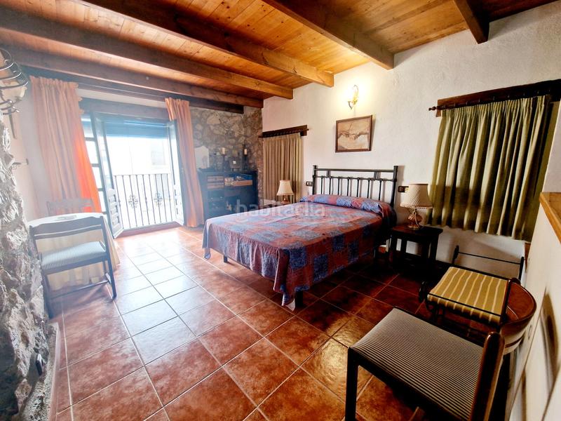 Foto 05cea4d1-c838-4d5e-a9c8-6cf18c53b31a. Haus mit kamin in Alcudia de Veo