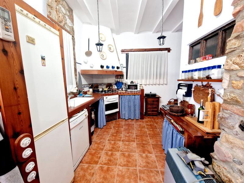 Foto dc6b5e4a-a363-4d89-9a81-f2e5ef41b7f8. Haus mit kamin in Alcudia de Veo