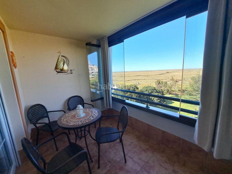 Foto f52740f3-7fc0-407d-9cde-348bd311e6b9. Appartement mit parking in Isla Canela Ayamonte