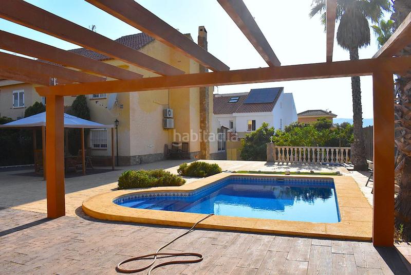 Foto be8b36c8-5eb3-46fe-86ab-cc0a8053dd4f. Casa amb calefacció piscina a Sierra Helada Benidorm