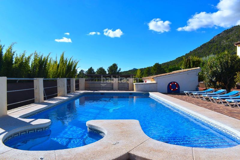 Foto 081db793-2a95-47e6-bdb4-d5b664fa797e. Casa amb calefacció piscina a balcón de ponoig - Polop paradis - Polop hills Polop