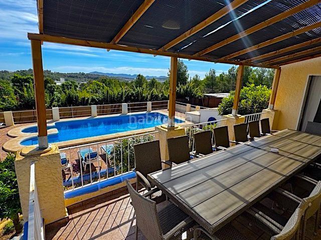 Foto 8296cc6b-9154-4f06-82e3-2d29c6ef7b50. Casa amb calefacció piscina a balcón de ponoig - Polop paradis - Polop hills Polop