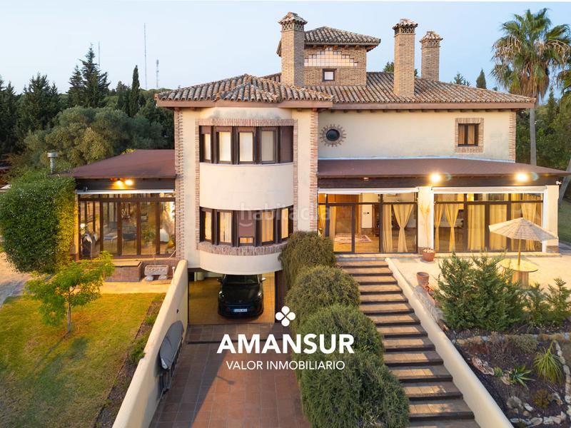 Foto 00f63abf-a5f8-41a8-9e38-b106f995ade2. Chalet con camino riscaldamento parcheggio piscina in Aljaraque