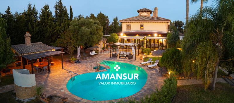 Foto 031e52fc-669f-4cd7-83ee-704c4c314349. Chalet con camino riscaldamento parcheggio piscina in Aljaraque