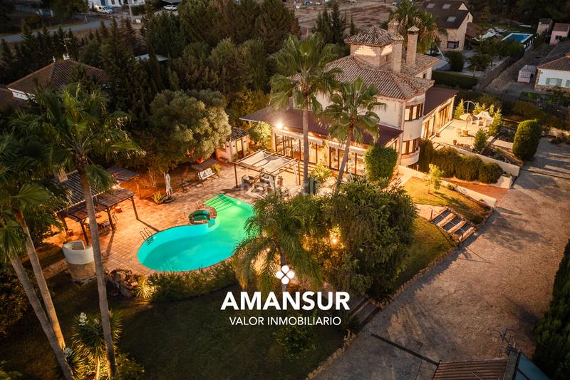 Foto 1388c255-007c-491a-9bb8-190c628c26ce. Chalet con camino riscaldamento parcheggio piscina in Aljaraque