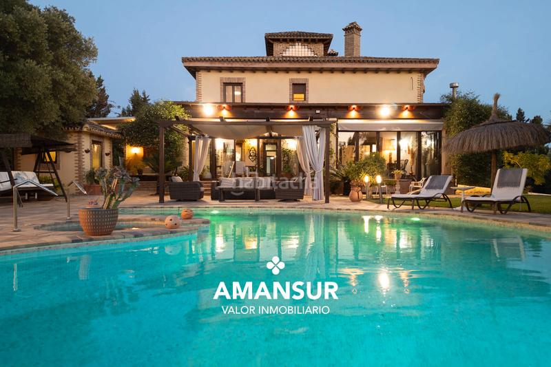 Foto 183cacd3-d7df-44c3-8083-accdc1e6cc65. Chalet con camino riscaldamento parcheggio piscina in Aljaraque