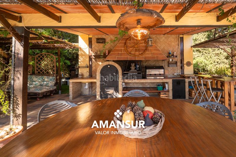 Foto 292c55fc-3e5a-4c16-befc-026256b06aa6. Chalet con camino riscaldamento parcheggio piscina in Aljaraque