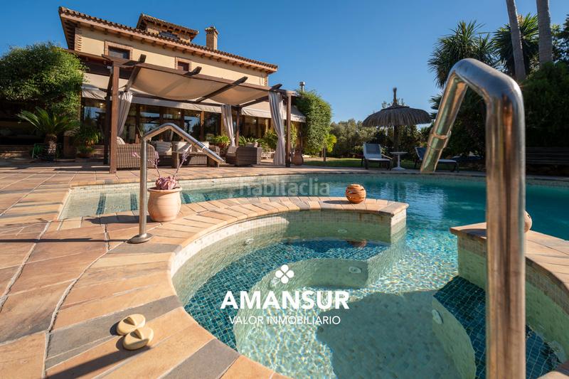 Foto 42a95a0d-5296-4c12-b4cc-e13196987650. Chalet con camino riscaldamento parcheggio piscina in Aljaraque