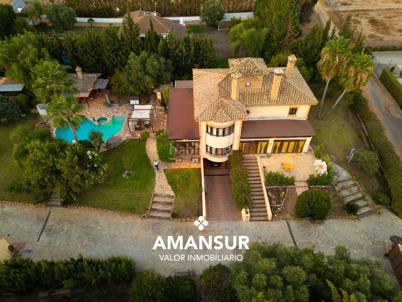 Foto 6ab6ba4b-9826-4558-86a8-79f4537ea98e. Chalet con camino riscaldamento parcheggio piscina in Aljaraque