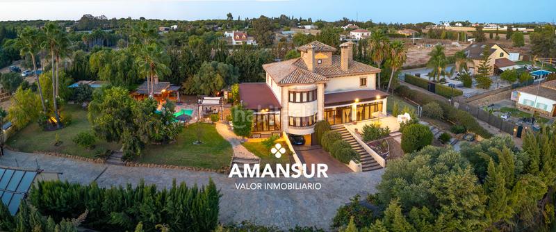 Foto 728b022a-7ee1-44ec-bc59-cddf20023944. Chalet con camino riscaldamento parcheggio piscina in Aljaraque