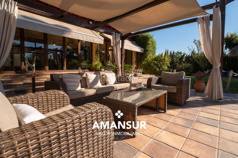 Foto c7414ccb-4b7c-4e64-b47e-c349db9c7985. Chalet con camino riscaldamento parcheggio piscina in Aljaraque