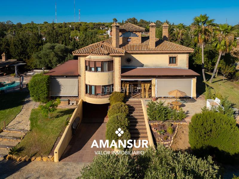 Foto c8a20c73-8306-4456-bb08-a074b8249851. Chalet con camino riscaldamento parcheggio piscina in Aljaraque