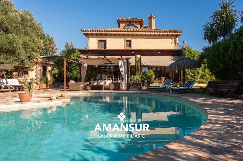 Foto dc0919a5-7117-40e4-8bec-3af9628cb258. Chalet con camino riscaldamento parcheggio piscina in Aljaraque