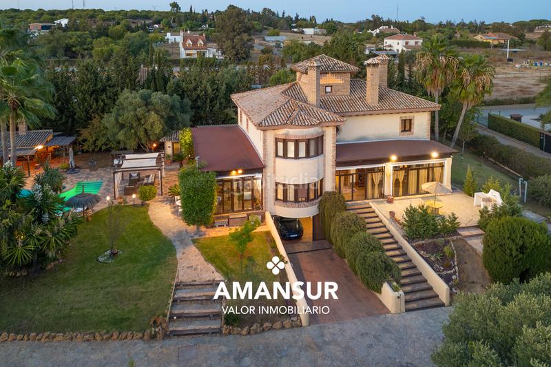 Foto e34b3733-324d-422e-a246-ddbaf840b395. Chalet con camino riscaldamento parcheggio piscina in Aljaraque