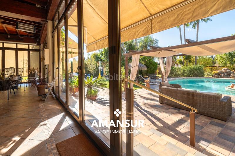 Foto f025f08a-d4a0-4b4a-8230-753f898d3e8d. Chalet con camino riscaldamento parcheggio piscina in Aljaraque