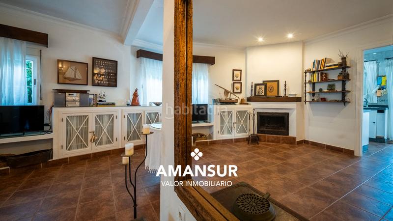 Foto 91c70f78-b3c2-4b93-aa33-abfbf3acd42b. Chalet with fireplace in Punta Umbría