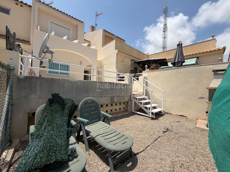 Foto 50c47228-d32b-4ce7-b7c9-335f2752b2a3. Casa adossada amb piscina a Pueblo Acantilado-Lanuza Campello (el)