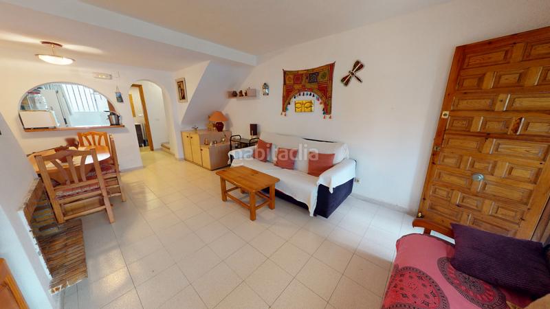 Foto eb553a41-f227-49a7-85bc-cca6587facca. Reihenhaus mit kamin pool in Pueblo Acantilado-Lanuza Campello (el)