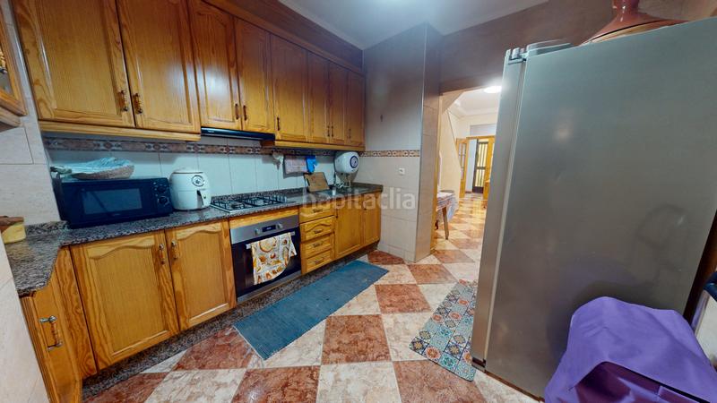 Foto 7954959f-75d3-429c-bf7f-879933807011. Maison jumelée avec cheminée dans Centro San Juan de Alicante