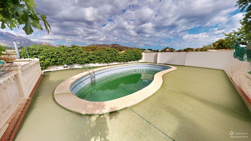 Foto 15dbfd23-4e11-4eaf-8211-10aae2c53789. Xalet amb aparcament piscina a Busot