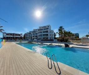 Apartament a El Puerto. Ático en primera línea de playa con vistas al mar  en denia. cos