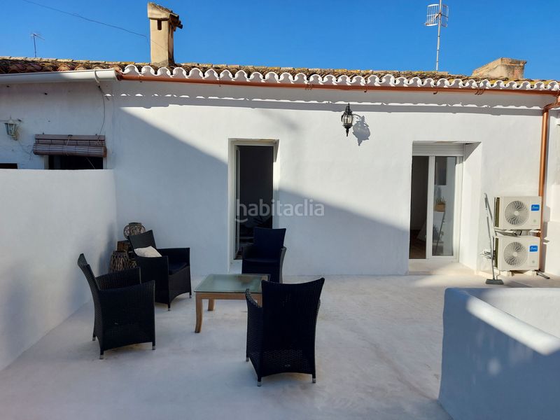 Foto 0a3e0bd5-ca21-4011-994f-22067448034f. Casa adossada amb xemeneia calefacció a Ondara