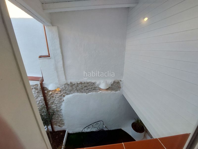 Foto 24de981f-28d4-44b7-a2c7-a573e8a01f4b. Casa adossada amb xemeneia calefacció a Ondara