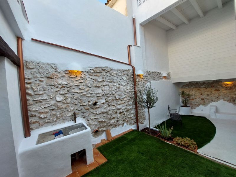 Foto 7fa9bede-c29d-4074-a7f8-589385b2c187. Casa adossada amb xemeneia calefacció a Ondara