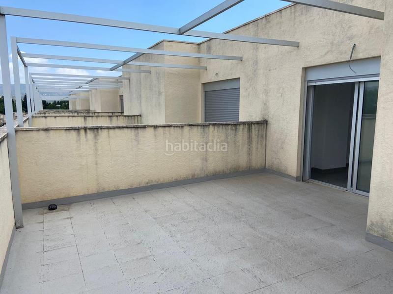 Foto 46a28583-6c30-48f4-9448-d1137e7743e6. Casa adosada  con garaje en Roquetes