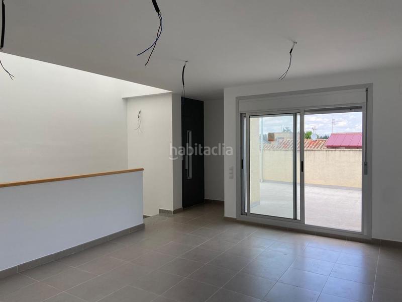 Foto 4878e545-7e52-46ba-97de-98d4cfec8bee. Casa adosada  con garaje en Roquetes